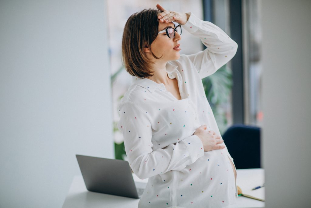 is headache a symptom of pregnancy